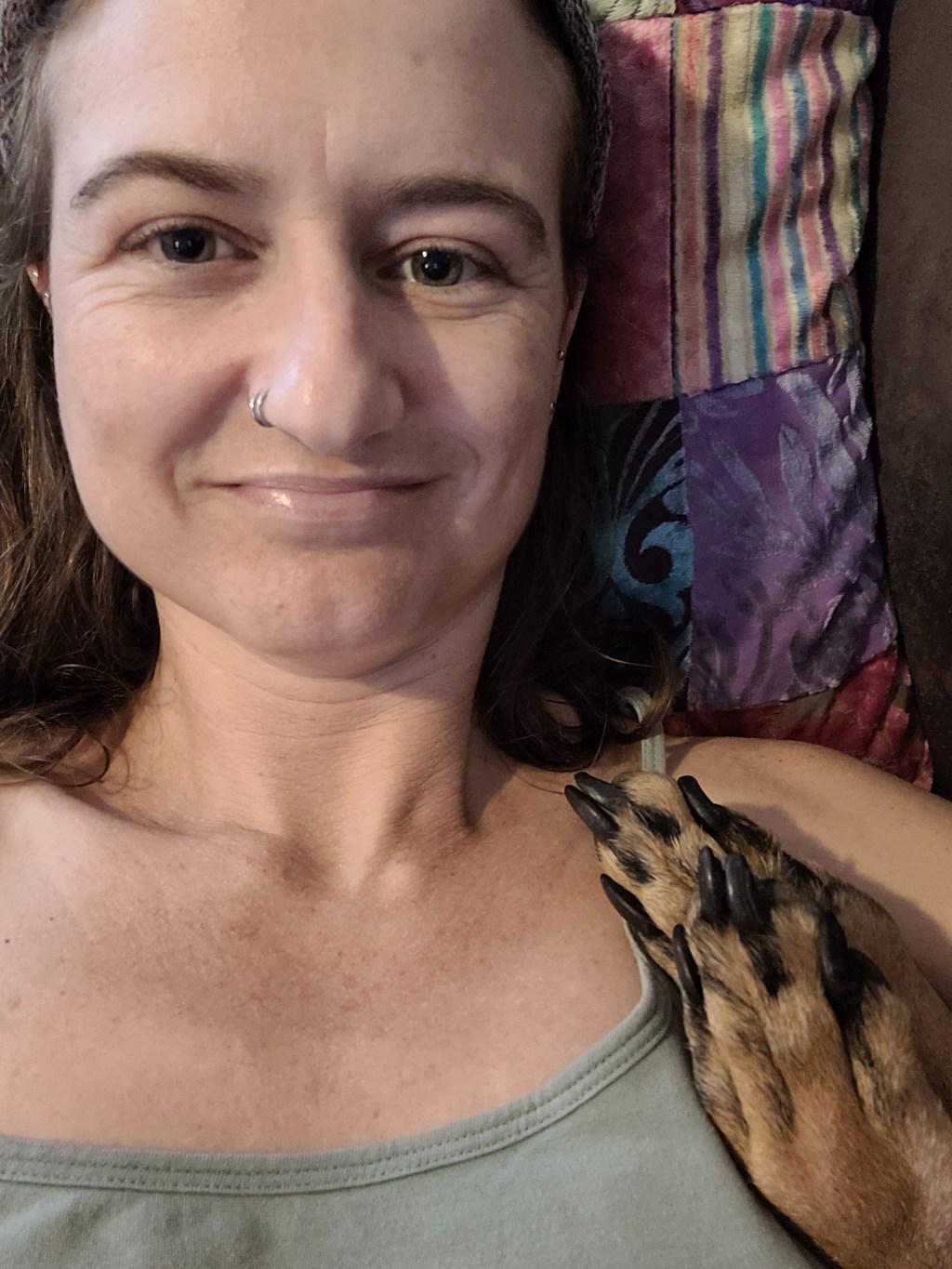 Lying next to Boss with his paws in my face&nbsp;🤣